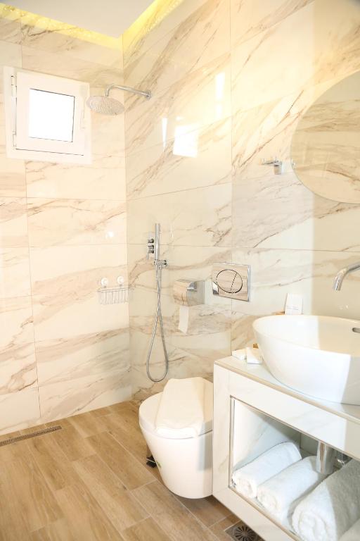 Koupelna v ubytování Coral Boutique Apartments
