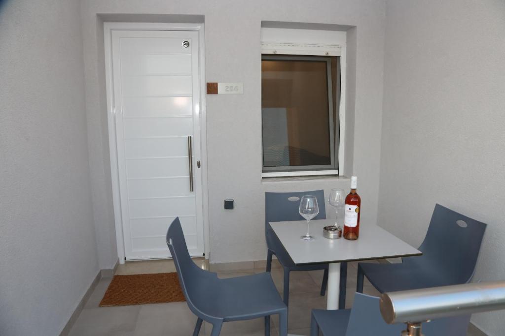 Fotografie z fotogalerie ubytování Coral Boutique Apartments v destinaci Ofrynio