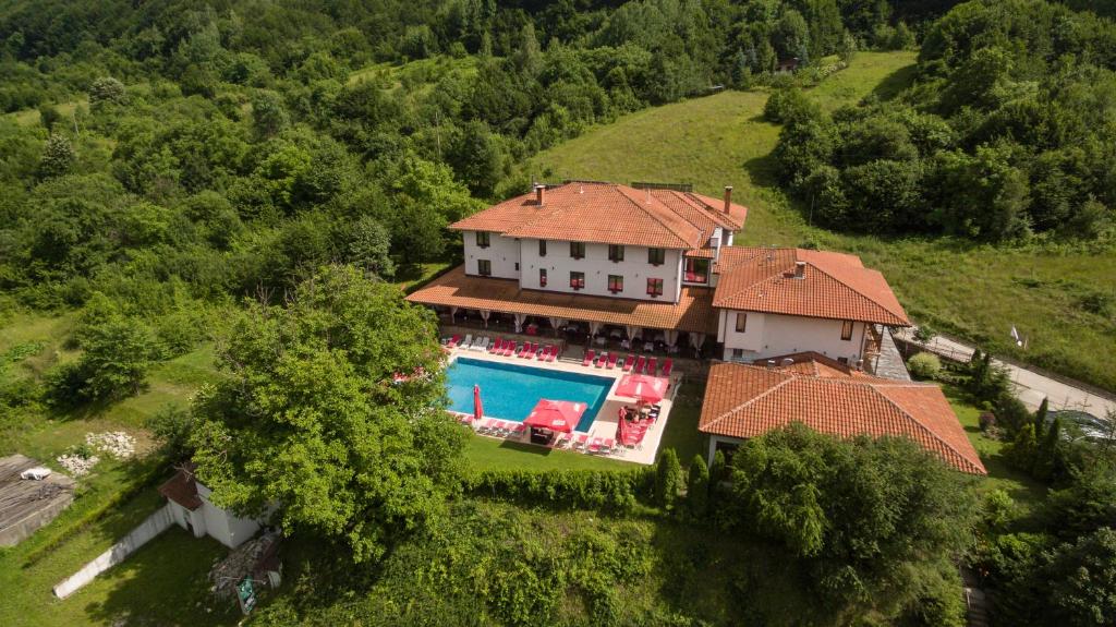 an aerial view of a house with a swimming pool at Park Hotel Fairy in Chiflik