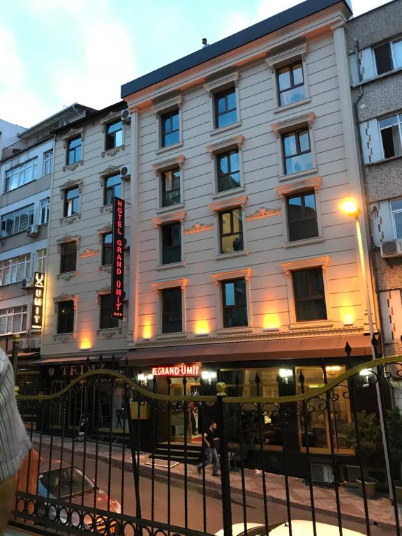 a building on the corner of a street at Hotel Grand Umit in Istanbul