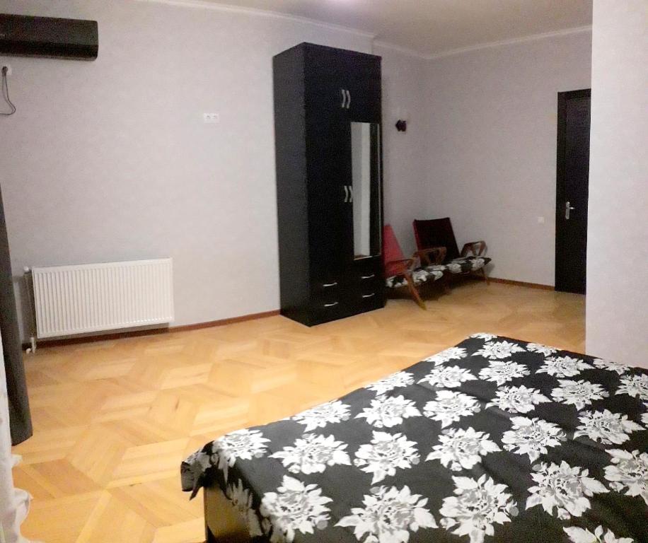 Postel nebo postele na pokoji v ubytování GNT+