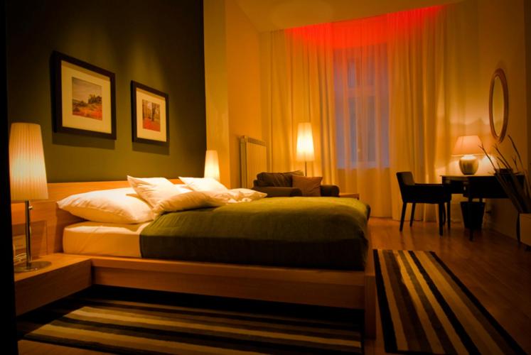 Postel nebo postele na pokoji v ubytování Ivana Hotel