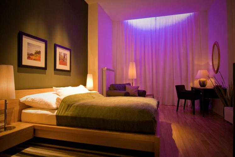 Postel nebo postele na pokoji v ubytování Ivana Hotel