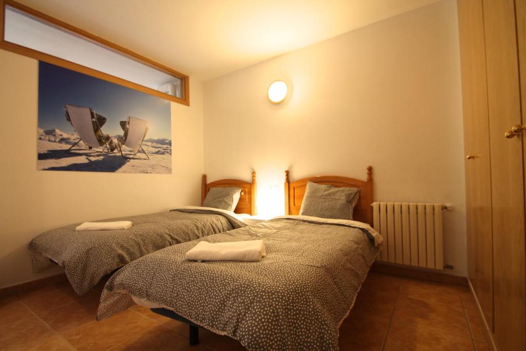 Postel nebo postele na pokoji v ubytování Pont de Toneta 3,3 Ransol, Zona Grandvalira