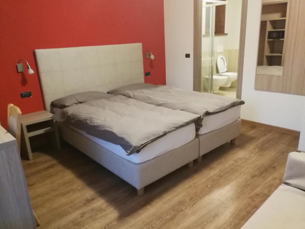 Posteľ alebo postele v izbe v ubytovaní Baita Belvedere Bondi & Teola - Appartamenti Abar