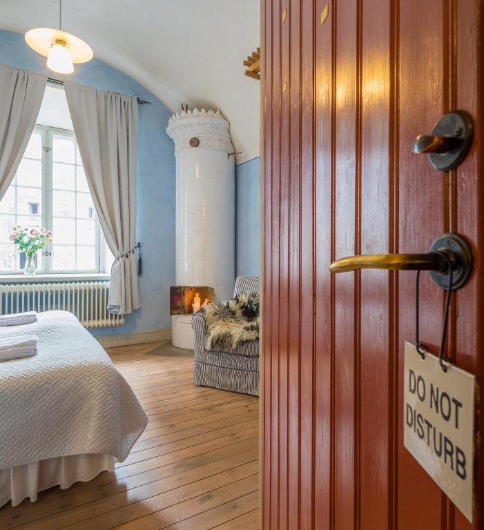 Postel nebo postele na pokoji v ubytování Kastellet Bed & Breakfast