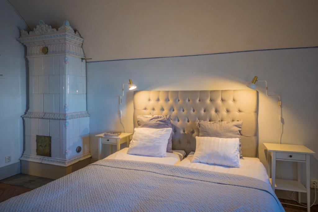 Postel nebo postele na pokoji v ubytování Kastellet Bed & Breakfast