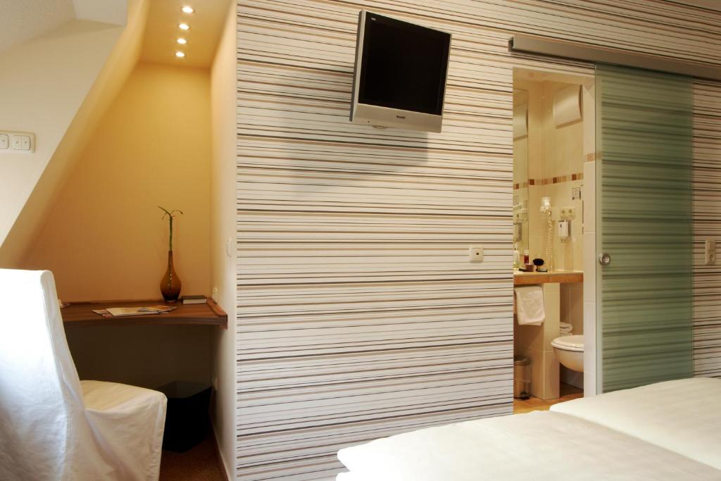Postel nebo postele na pokoji v ubytování Hotel Zum Bären