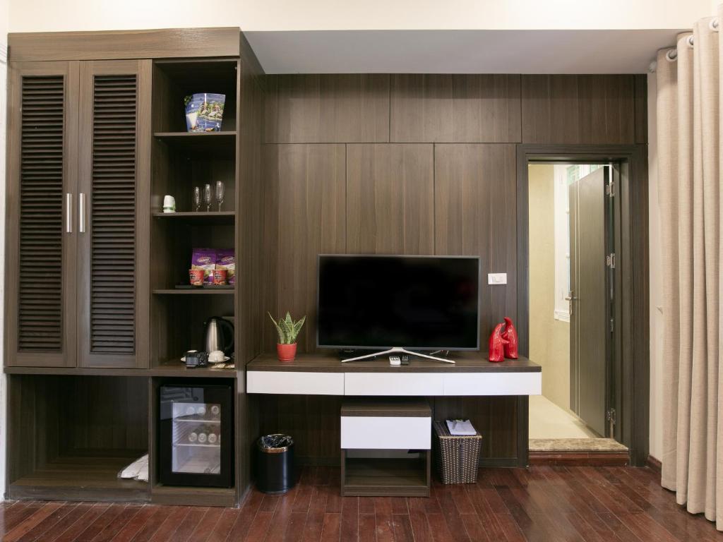 TV a/nebo společenská místnost v ubytování Blubiz Hotel My Dinh Song Da