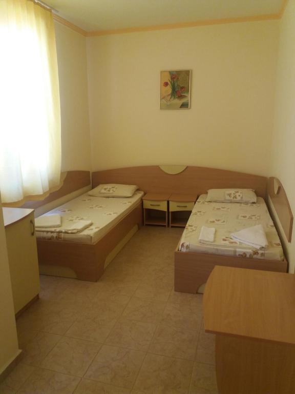 Postel nebo postele na pokoji v ubytování Hotel Apart