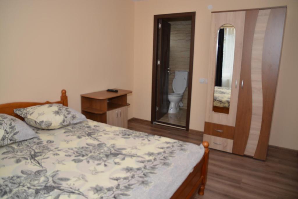 Letto o letti in una camera di Bogdan si Raluca