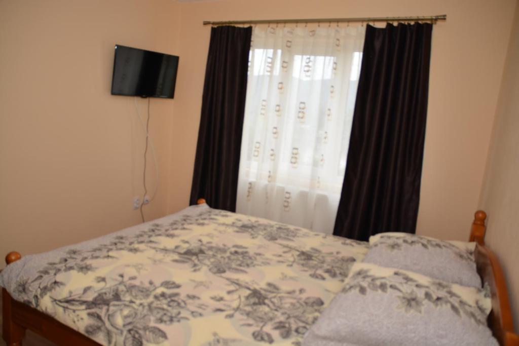 Letto o letti in una camera di Bogdan si Raluca