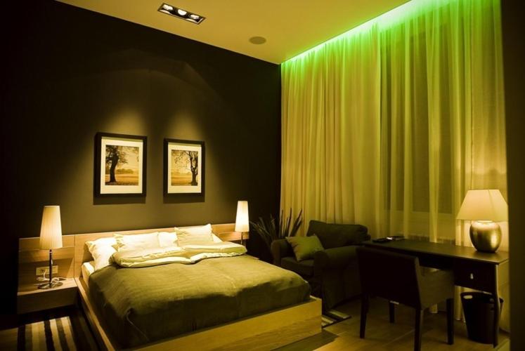 Postel nebo postele na pokoji v ubytování Ivana Hotel