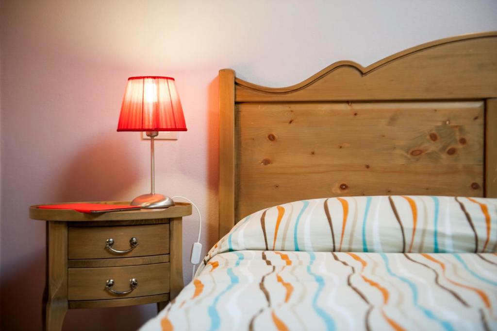Postel nebo postele na pokoji v ubytování Albergo Parigi
