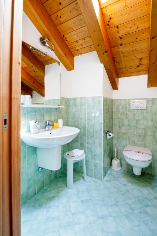 Koupelna v ubytování Albergo Parigi