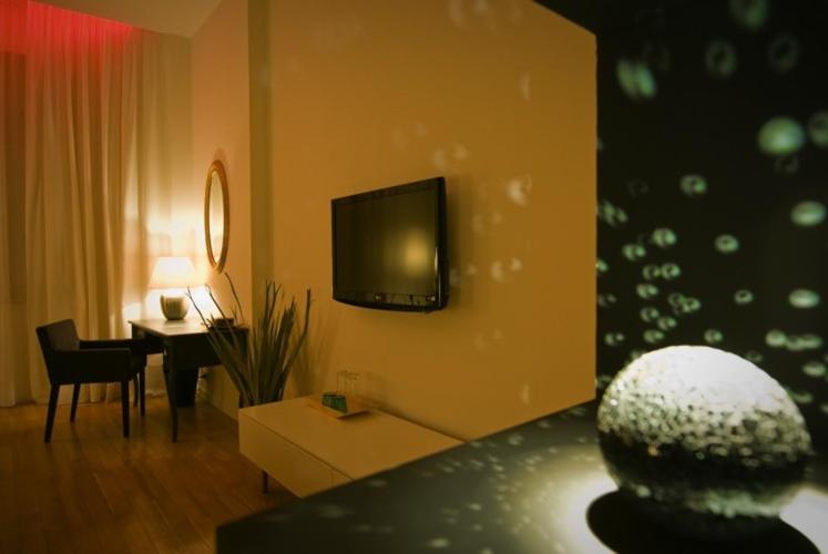 TV a/nebo společenská místnost v ubytování Ivana Hotel