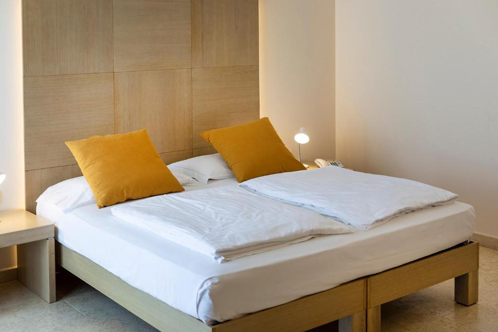 Postel nebo postele na pokoji v ubytování Hotel Garnì Orchidea