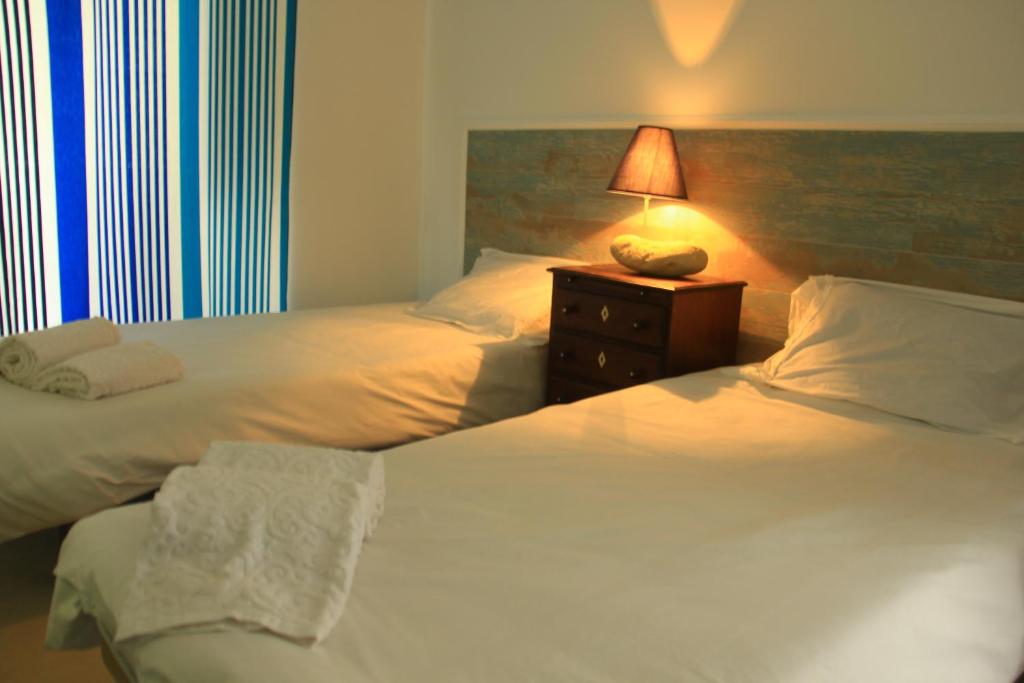 Katil atau katil-katil dalam bilik di Casas do Patio sem Cantigas 5
