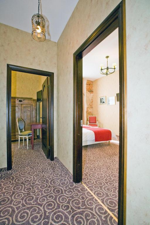 Postel nebo postele na pokoji v ubytování Boutique Hotel Justus