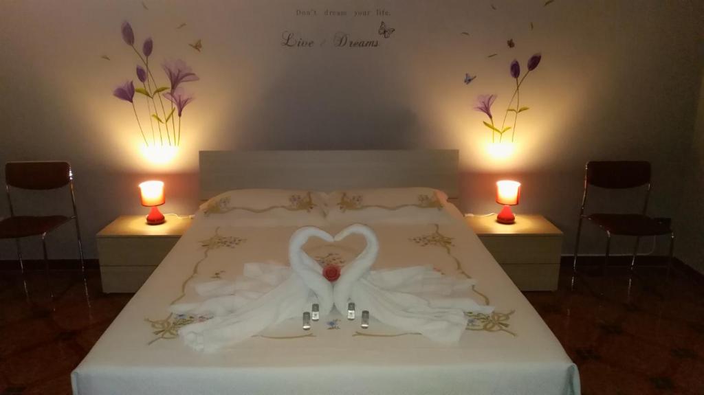 Postel nebo postele na pokoji v ubytování B&B Al centro di Lecce