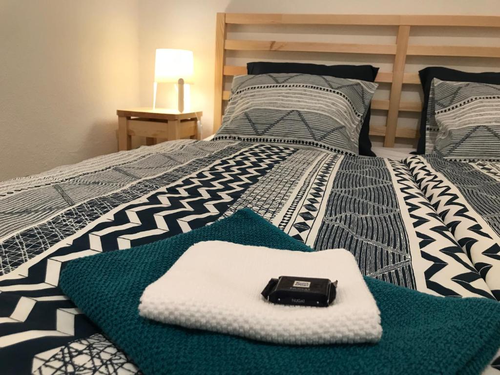 מיטה או מיטות בחדר ב-Chata Domaša - Monika