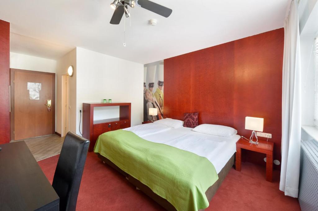 Ліжко або ліжка в номері Am Neutor Hotel Salzburg Zentrum
