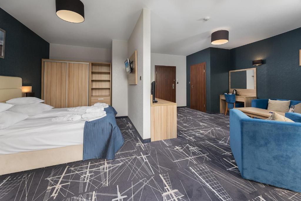Postel nebo postele na pokoji v ubytování Hotel Faleza - z widokiem na morze