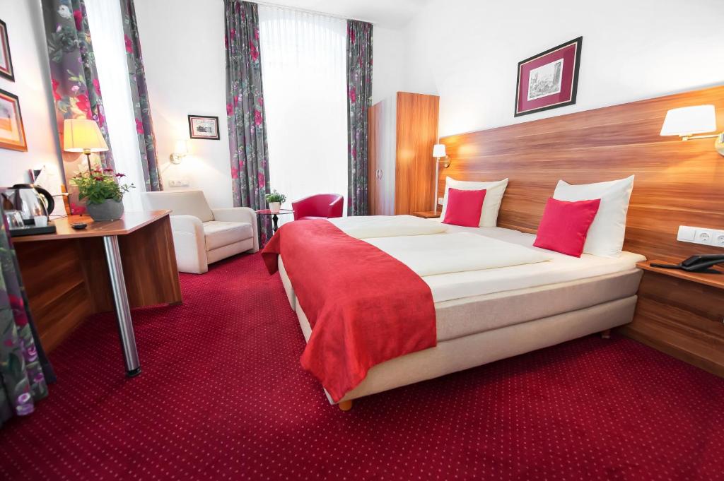 Postel nebo postele na pokoji v ubytování Hotel Weierich