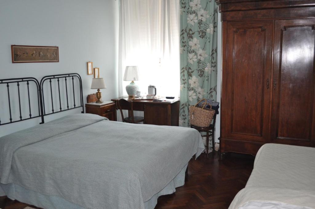 Postel nebo postele na pokoji v ubytování Villa L'Aurora
