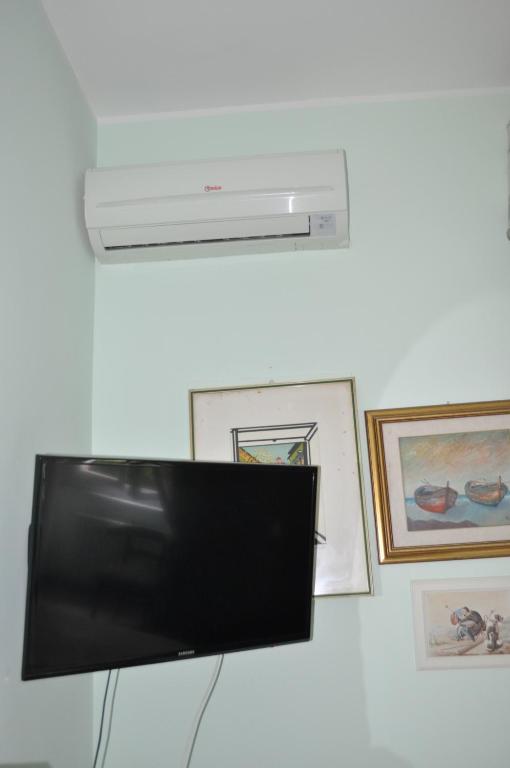 TV a/nebo společenská místnost v ubytování Villa L'Aurora