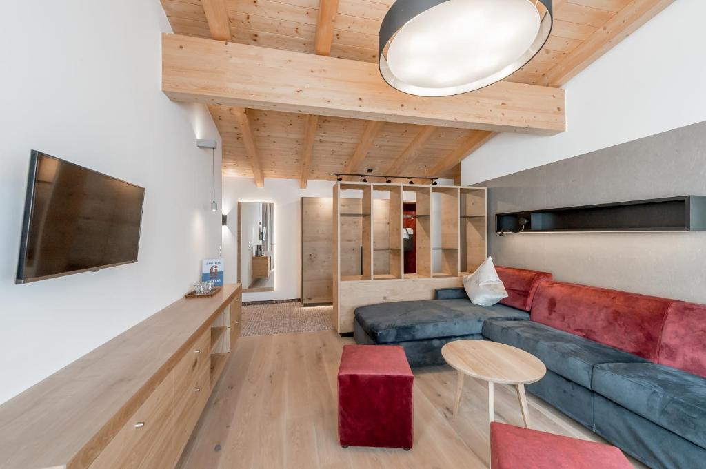 TV a/nebo společenská místnost v ubytování Hotel Grauer Bär