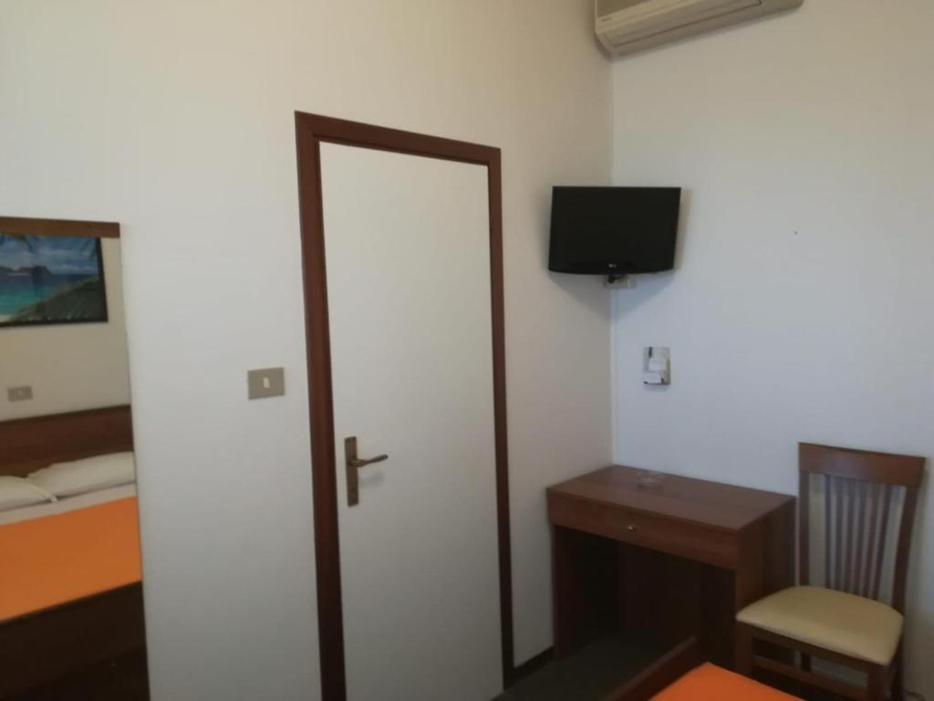 TV a/nebo společenská místnost v ubytování Hotel Tuscolano