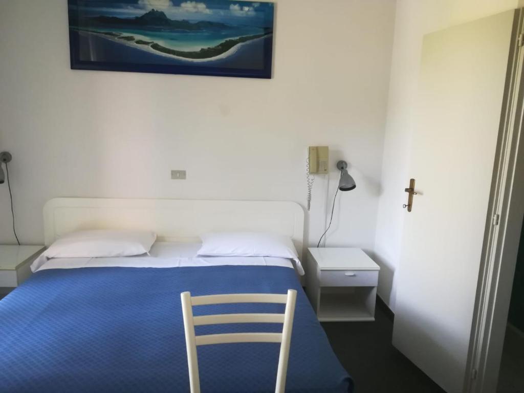 Postel nebo postele na pokoji v ubytování Hotel Tuscolano
