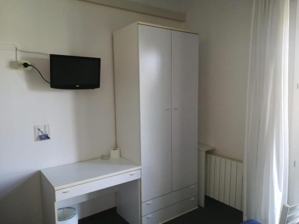 TV a/nebo společenská místnost v ubytování Hotel Tuscolano