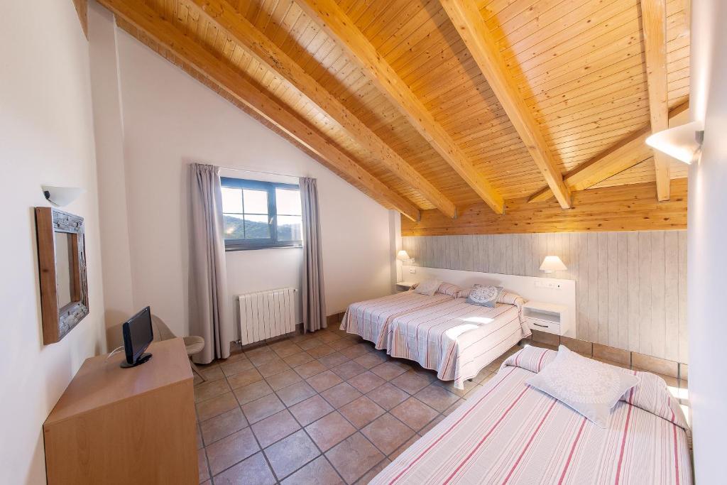Postel nebo postele na pokoji v ubytování Hostal Pagozelai