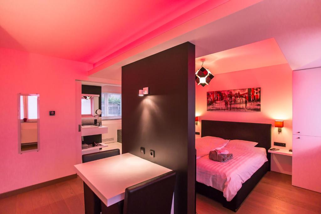 Postel nebo postele na pokoji v ubytování Wellness Hasselt B&B