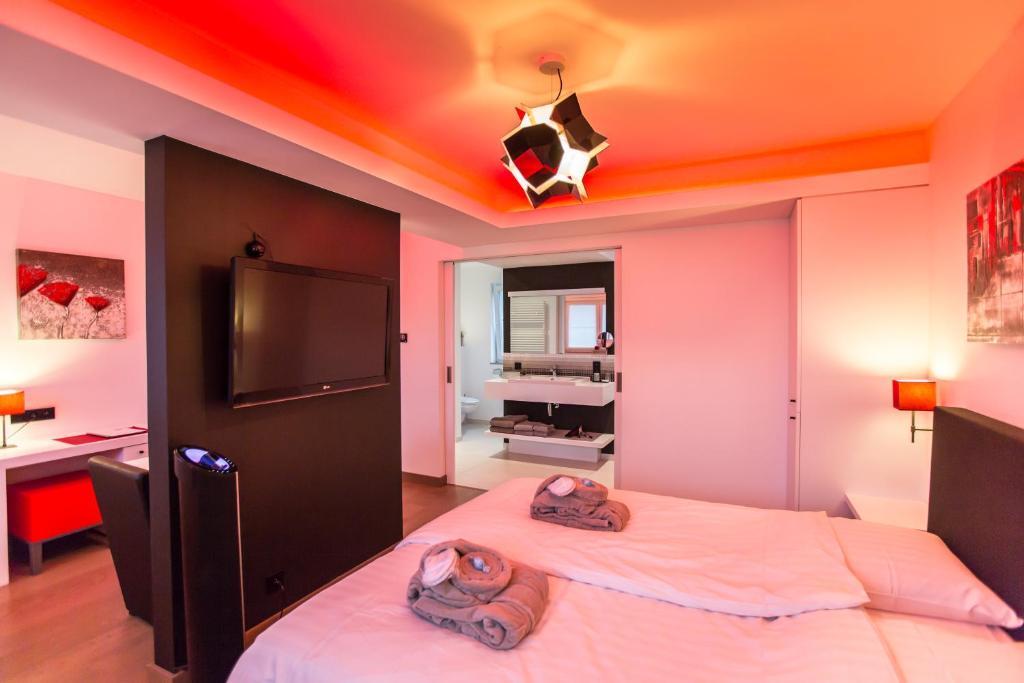 Postel nebo postele na pokoji v ubytování Wellness Hasselt B&B