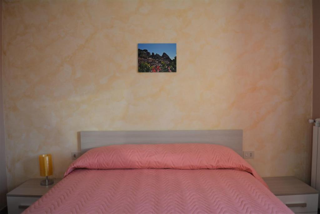 Postel nebo postele na pokoji v ubytování Spazio Natura