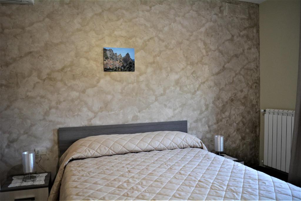 Postel nebo postele na pokoji v ubytování Spazio Natura