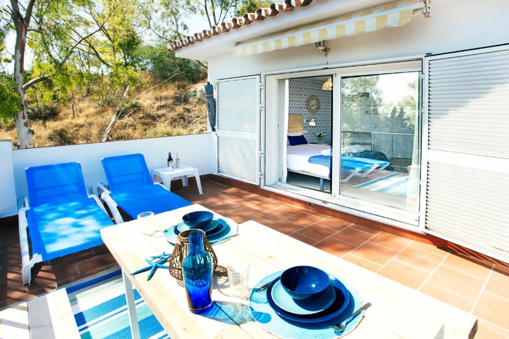 Patio lub wspólna przestrzeń na świeżym powietrzu w obiekcie PEDREGALEJO SUN & RELAX