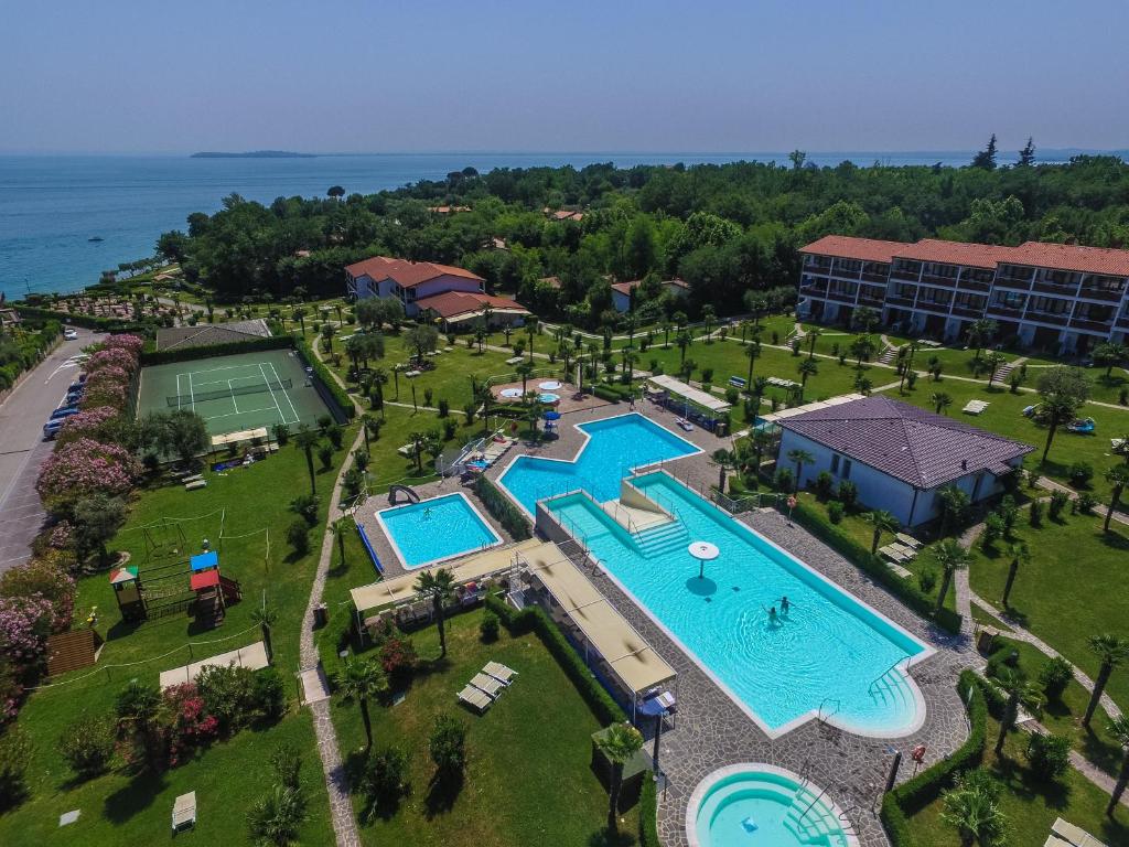 an overhead view of a pool at a resort at Apparthotel San Sivino in Manerba del Garda