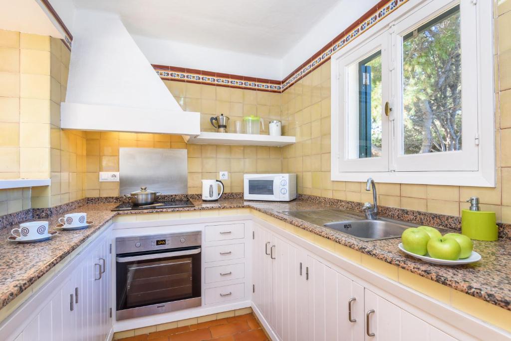 Kuchyň nebo kuchyňský kout v ubytování Villa BiniClara