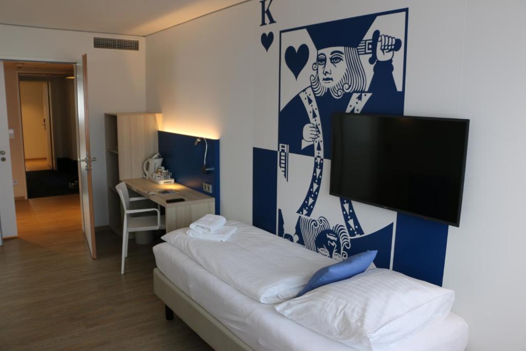 TV a/nebo společenská místnost v ubytování Aparthotel Paderborn