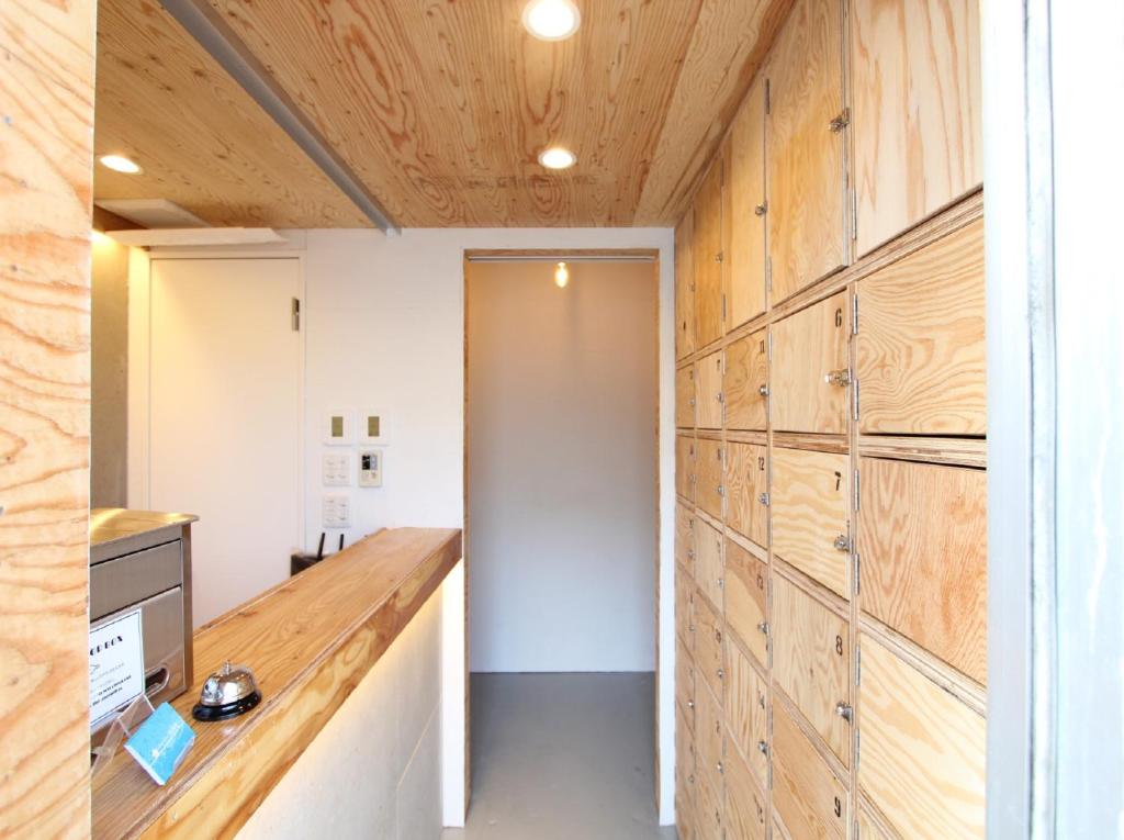 Kuchyň nebo kuchyňský kout v ubytování Ishigaki Guesthouse HIVE