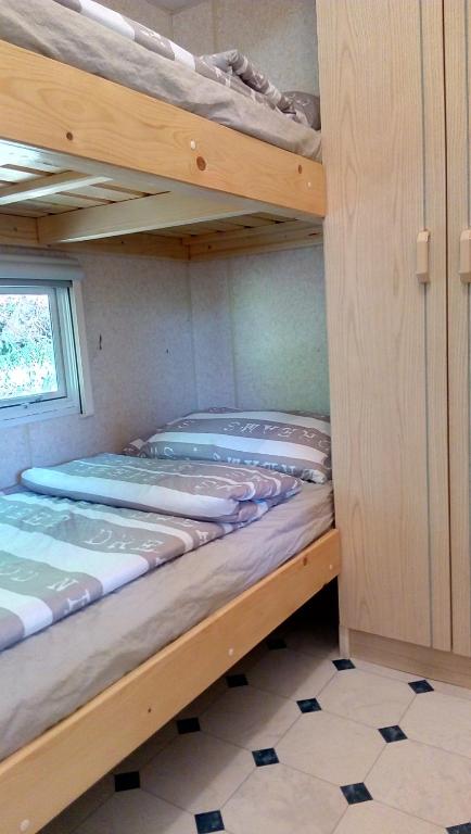 Postel nebo postele na pokoji v ubytování Samson mobile house