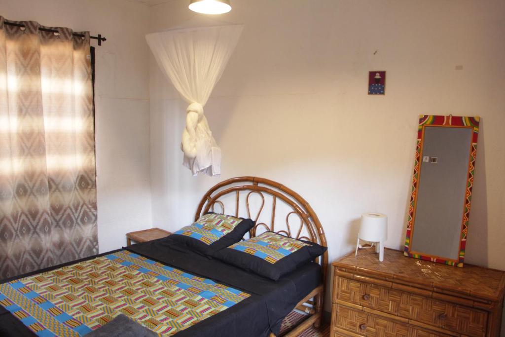 Posteľ alebo postele v izbe v ubytovaní Ouaka