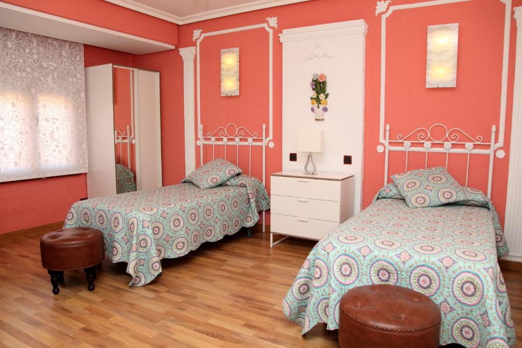 Posteľ alebo postele v izbe v ubytovaní Casa Tiburcio