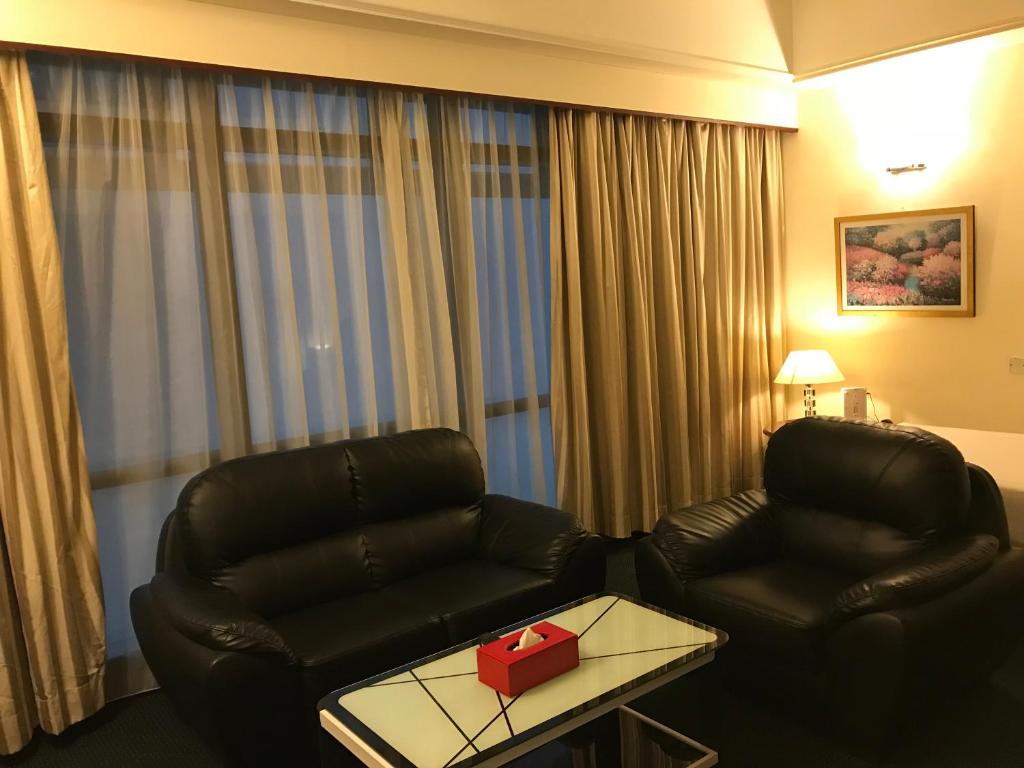 Ein Sitzbereich in der Unterkunft KL Service Suites at Times Square KL