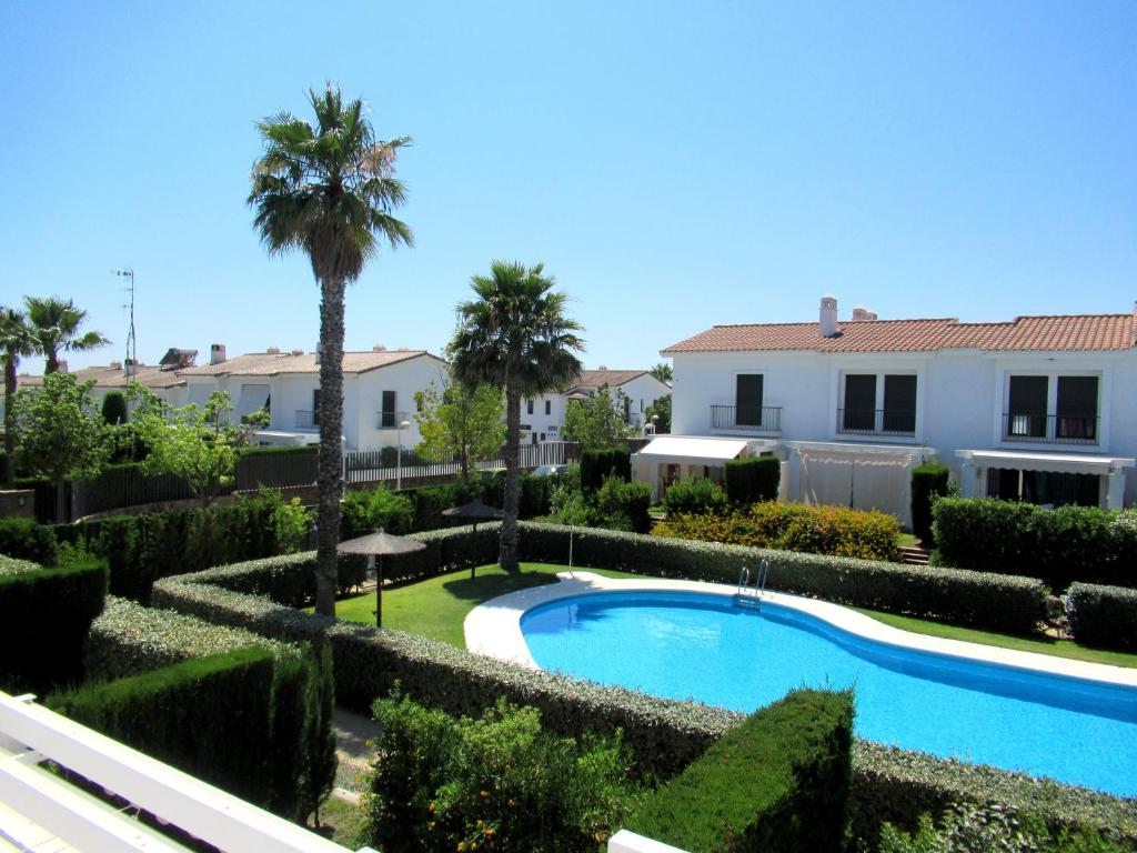 Bazén v ubytovaní Single room in private house el rompido alebo v jeho blízkosti