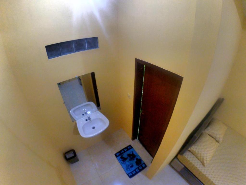 Koupelna v ubytování Nitha Homestay